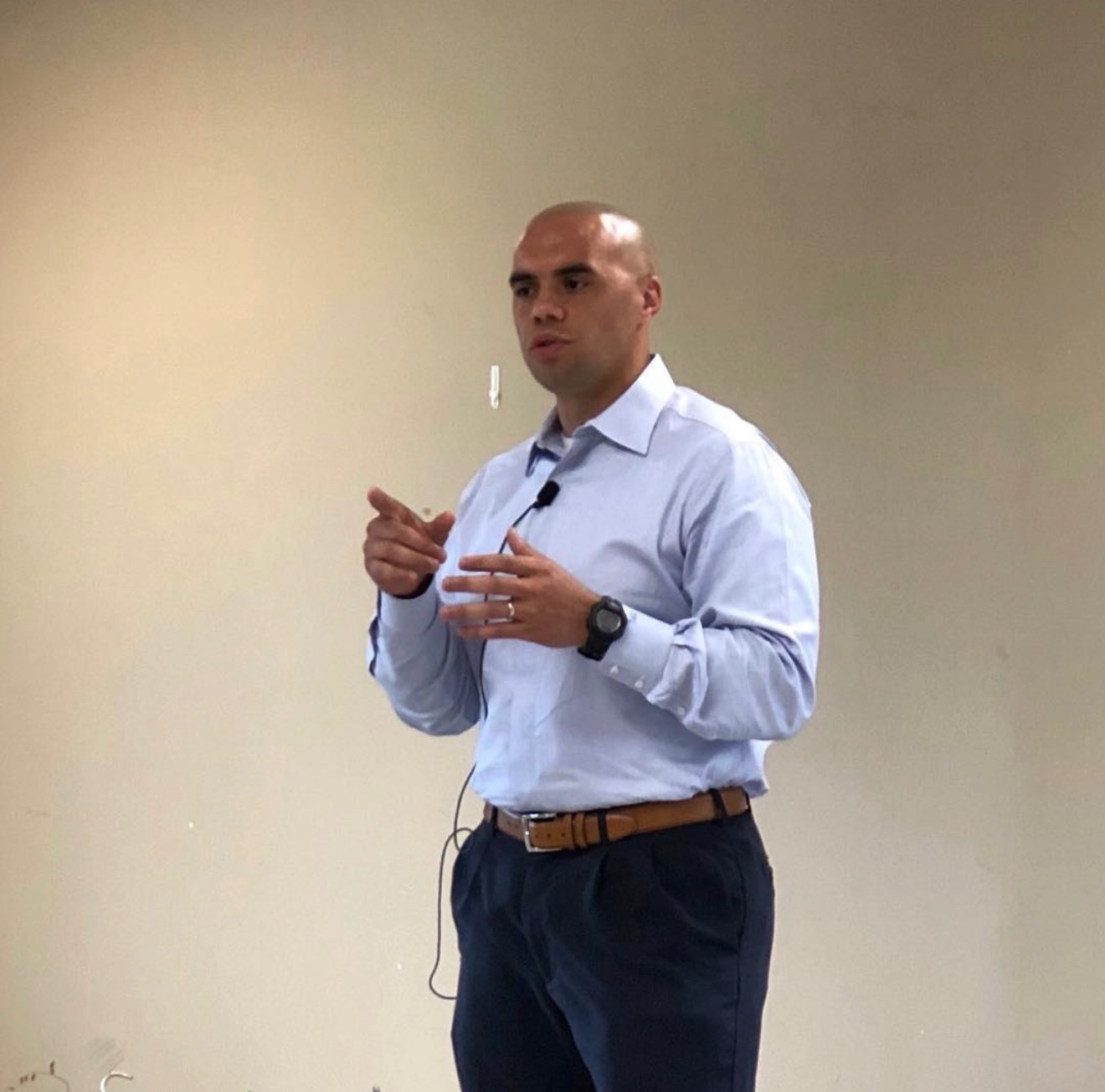 Tyson Lee presenting to a group